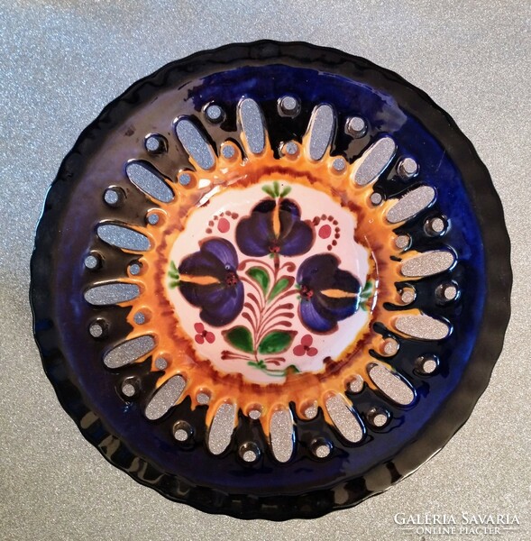 Openwork ceramic decorative bowl with a folk motif