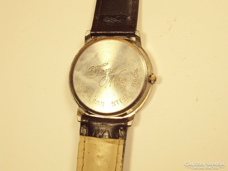 Retro old watch wristwatch with time wise quartz inscription