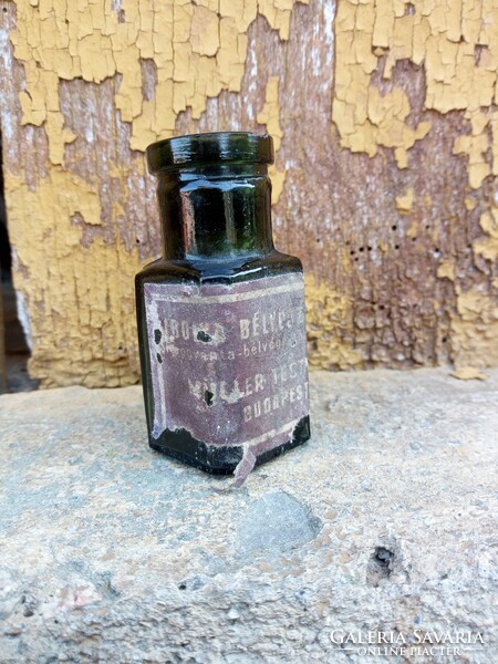 Old bottle with ink label, Müller brothers