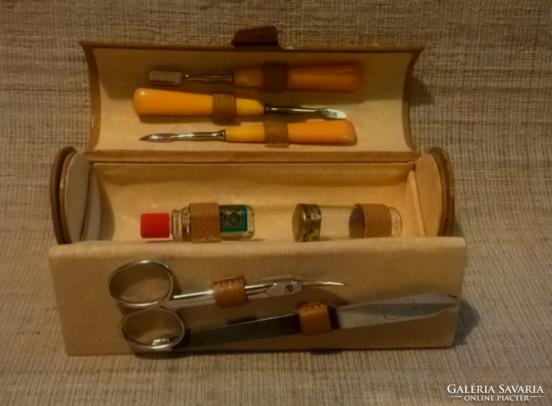 Old marked manicure set in leather case