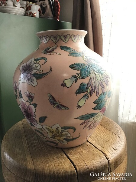Old oriental hand-painted porcelain vase