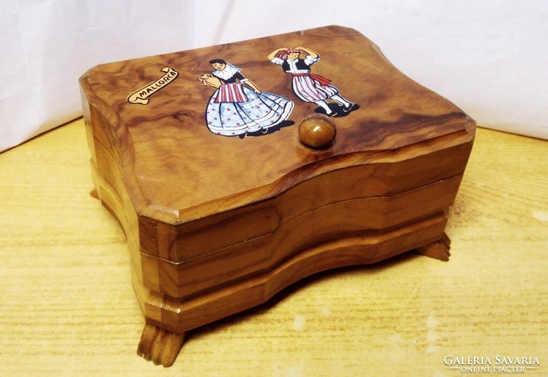 A souvenir from Mallorca, a mirrored wooden jewelry box with a dancing couple.