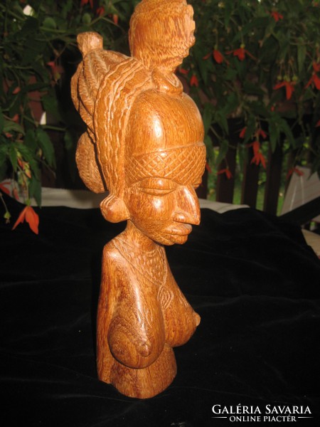 Beautifully carved African lady, half nude, approx. 20 cm
