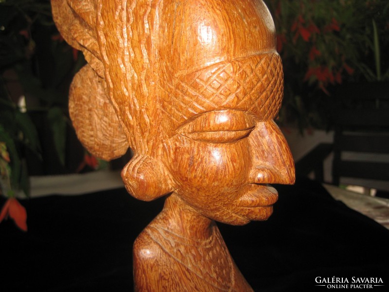 Beautifully carved African lady, half nude, approx. 20 cm