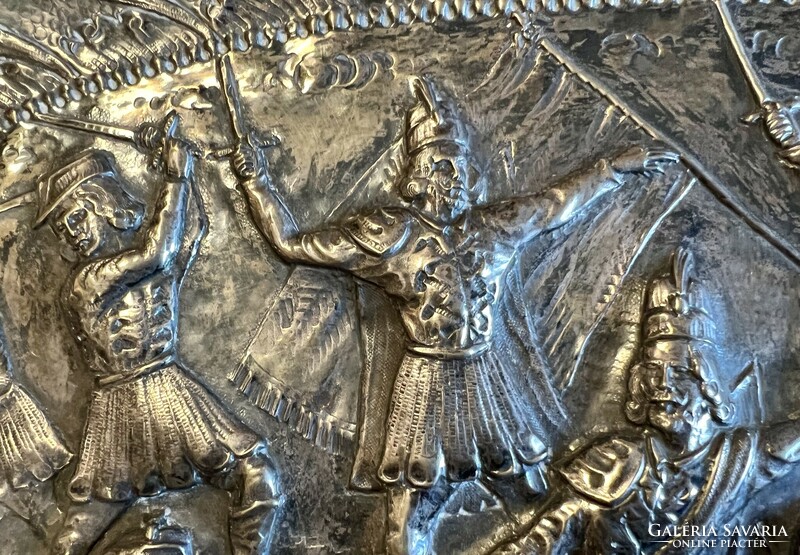 Silver, large decorative wall bowl, relief, with a battle symbol, hand hammered