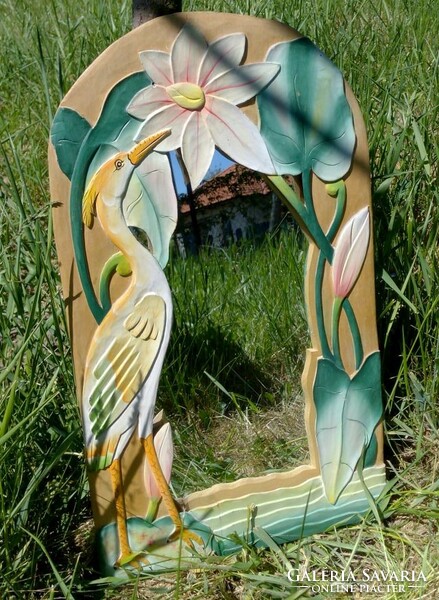 Dressing mirror with decorative carved and painted front. Waterside atmosphere.