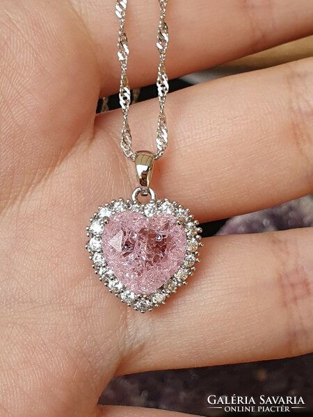 Crushed rose quartz pendant / necklace in a medical metal holder