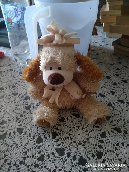 Plush dog with a hat, negotiable