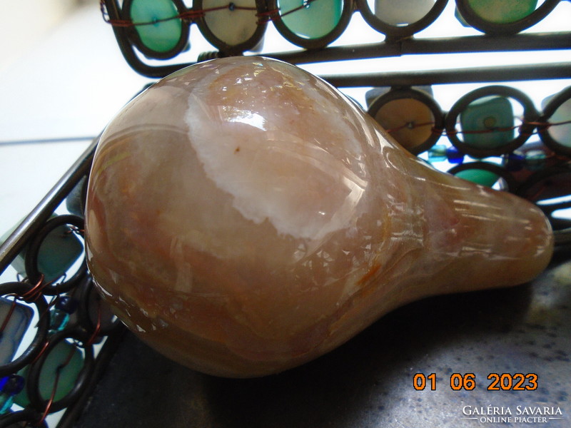 Polished onyx pear figure, sculpture with copper stem