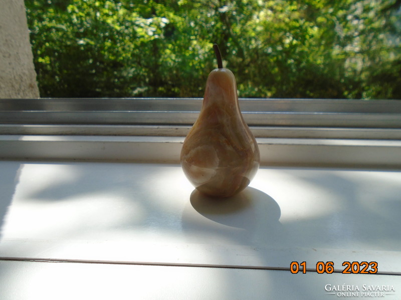 Polished onyx pear figure, sculpture with copper stem