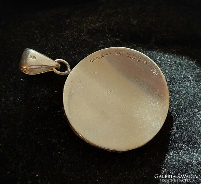 Handmade round silver pendant