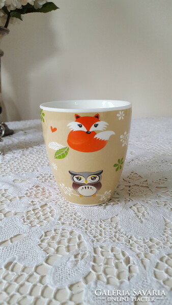 Large mug with owl and fox decoration.