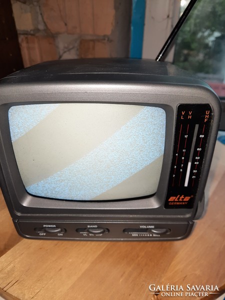 Retro mini portable black and white TV in original box with papers. Elta 2207