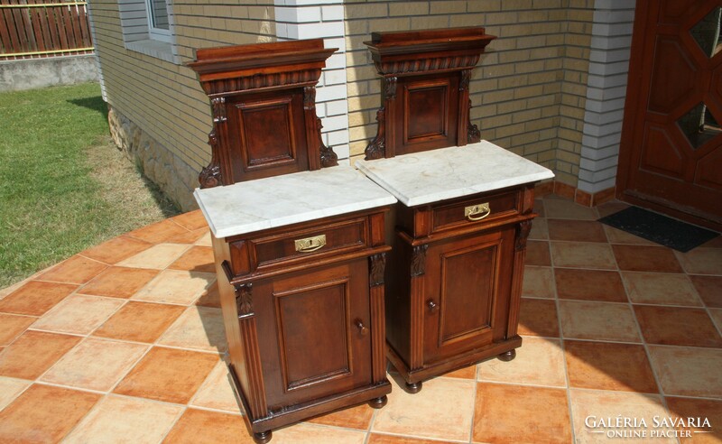 A pair of Old German marble-topped bedside tables