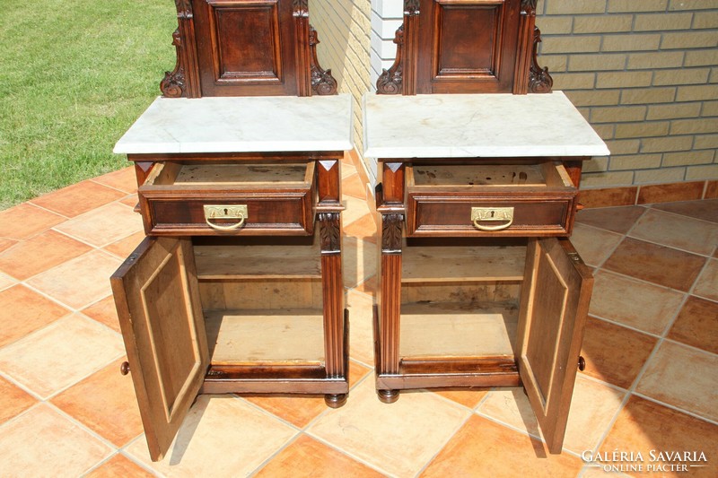 A pair of Old German marble-topped bedside tables