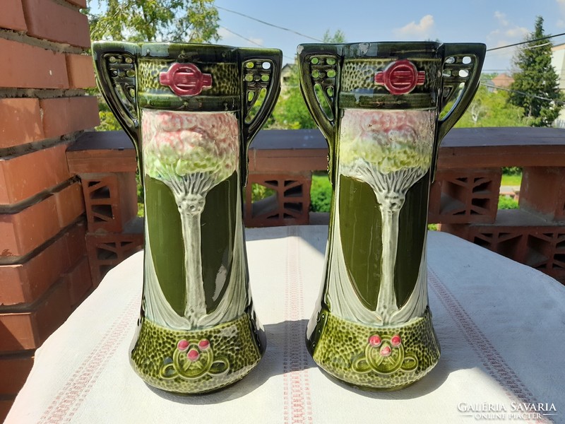 A pair of Art Nouveau majolica decorative vases