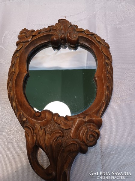 Wood carved hand mirror