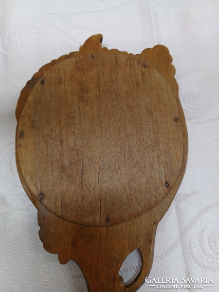 Wood carved hand mirror