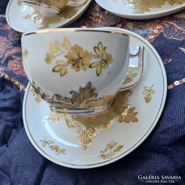 Russian teacups with a bulging leaf pattern