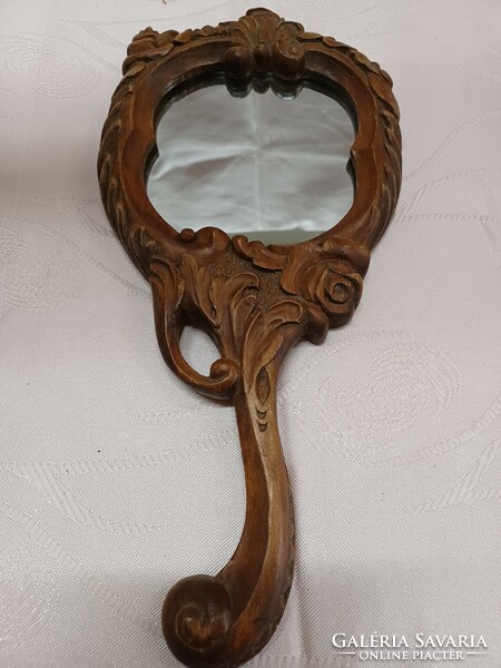 Wood carved hand mirror