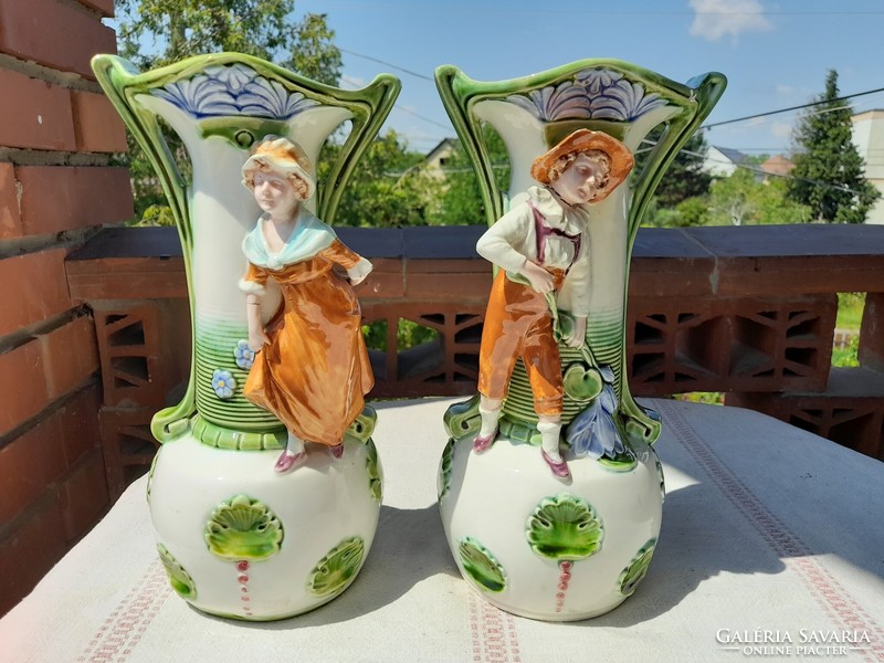 A pair of Art Nouveau majolica figurine vases