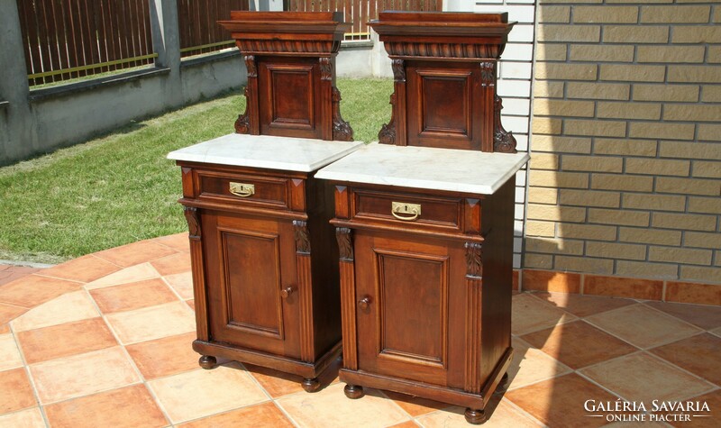 A pair of Old German marble-topped bedside tables