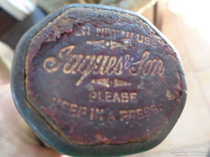 Antique tennis racket, with contemporary canvas case, marked old sports equipment from the 1910s