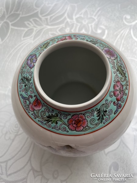 Porcelain vase holding Chinese ginger or tea