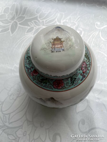 Porcelain vase holding Chinese ginger or tea