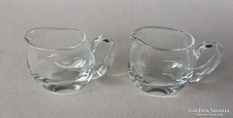 Pair of special, flattened glass jugs