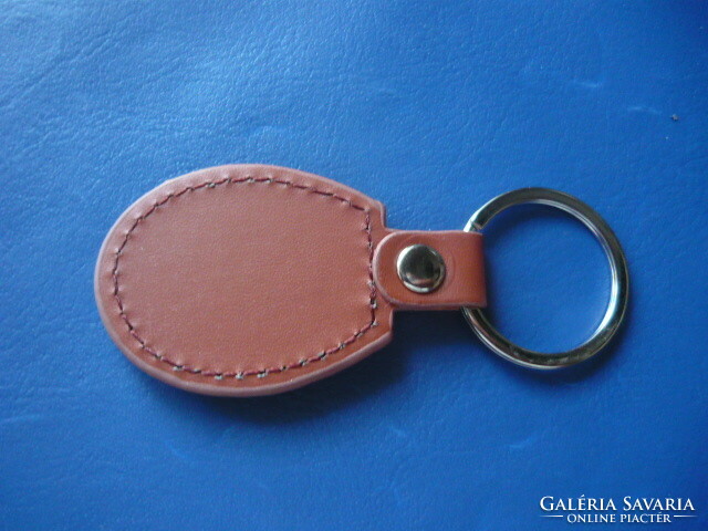 Keeway motorcycle oval metal key ring on a leather base