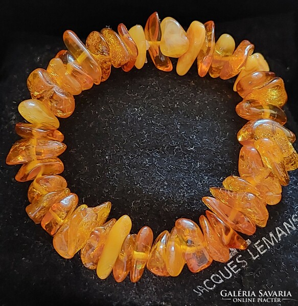 Multi-colored Baltic amber bracelet strung on a flexible rubber band