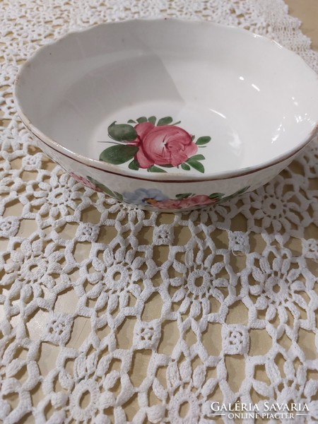 A beautiful, pink, rarely painted granite bowl, can be hung on the wall