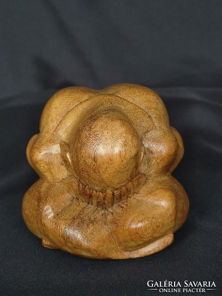 Carved Weeping Buddha statue