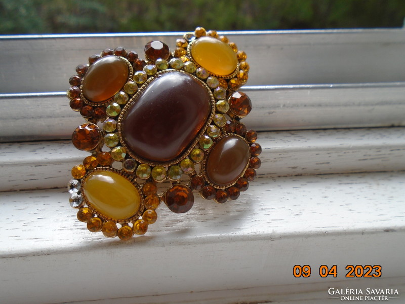 Antique spectacular gilded brooch pendant textured with amber colored stones