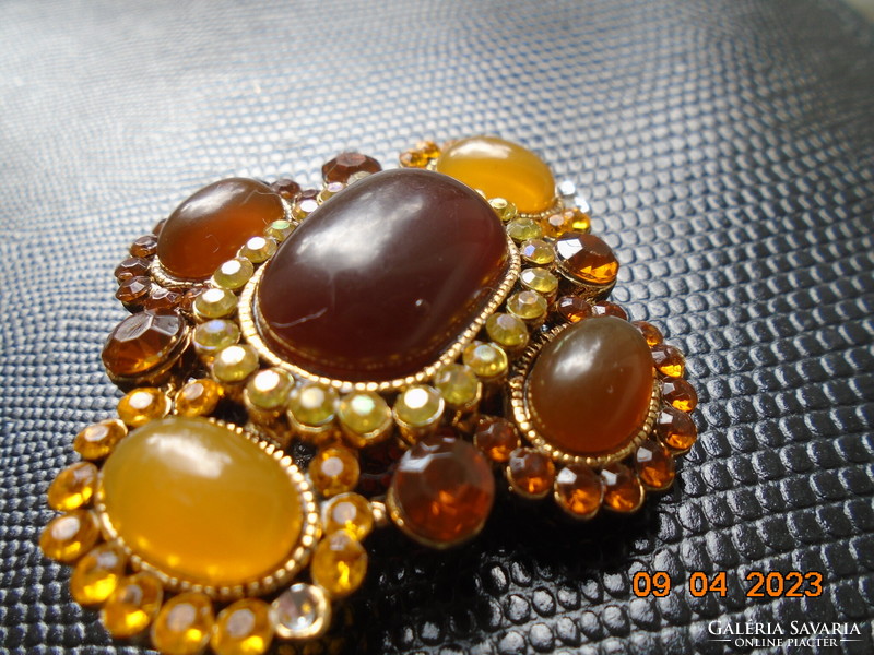 Antique spectacular gilded brooch pendant textured with amber colored stones