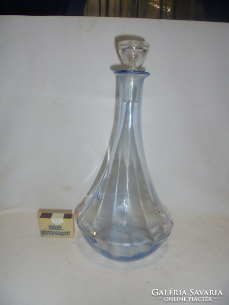 Old, pale blue wine bottle, decanter