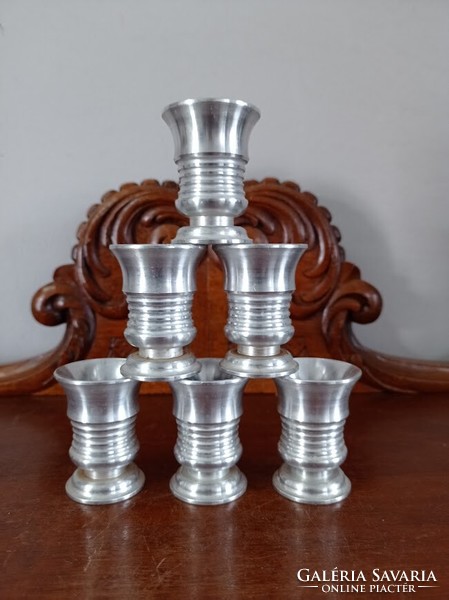 Set of metal cup, schnapps and brandy glasses