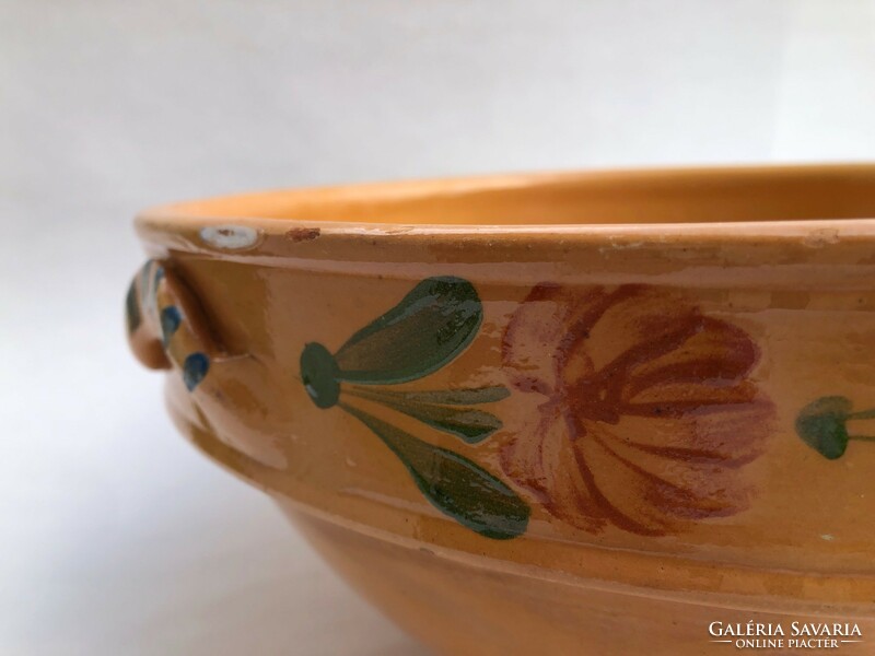 Glazed earthenware jars and large decorative earthenware bowls