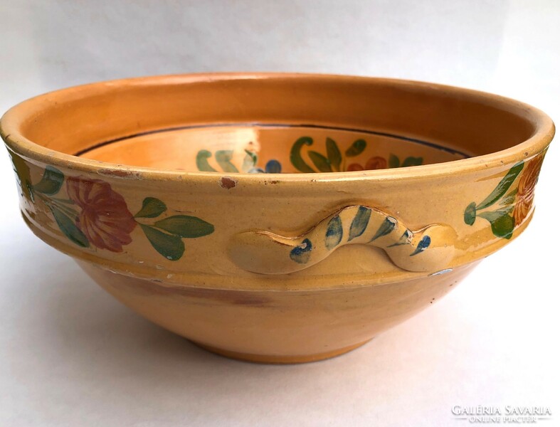 Glazed earthenware jars and large decorative earthenware bowls