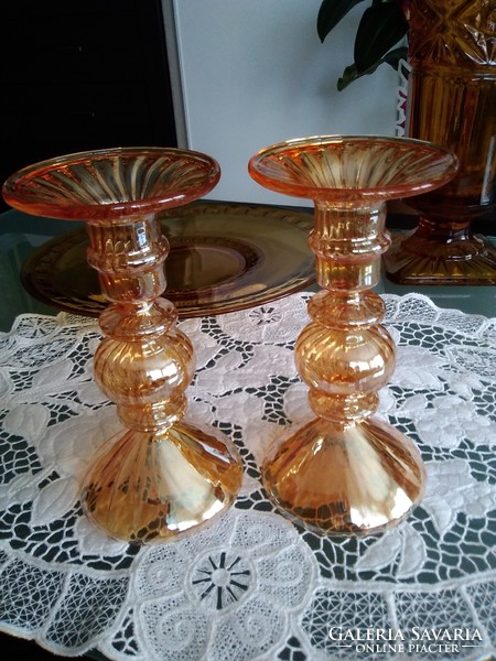 Extremely modern villeroy & boch blown glass candle holders in shimmering peach.