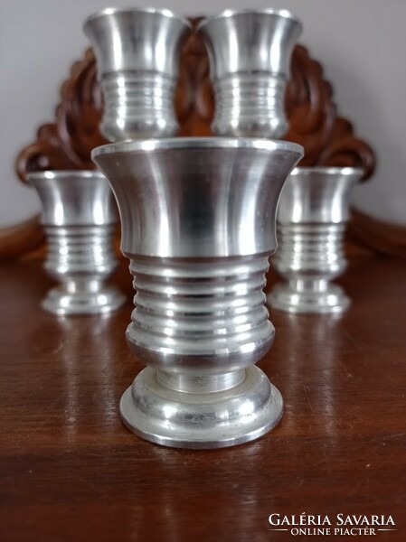 Set of metal cup, schnapps and brandy glasses