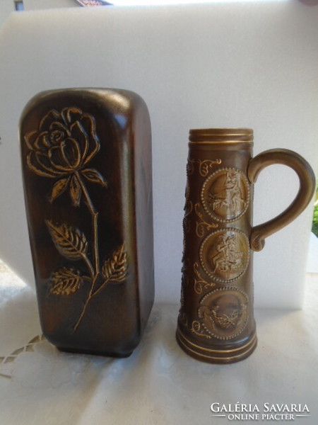 1 brown uniquely shaped vase in display case condition and 1 larger special jug