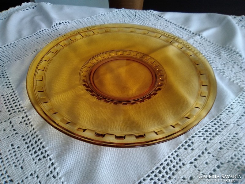 Art deco amber-colored glass serving plate with a special modern pattern.