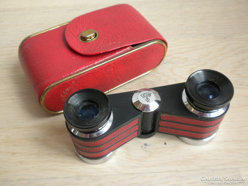 Red theater glasses in a leather case