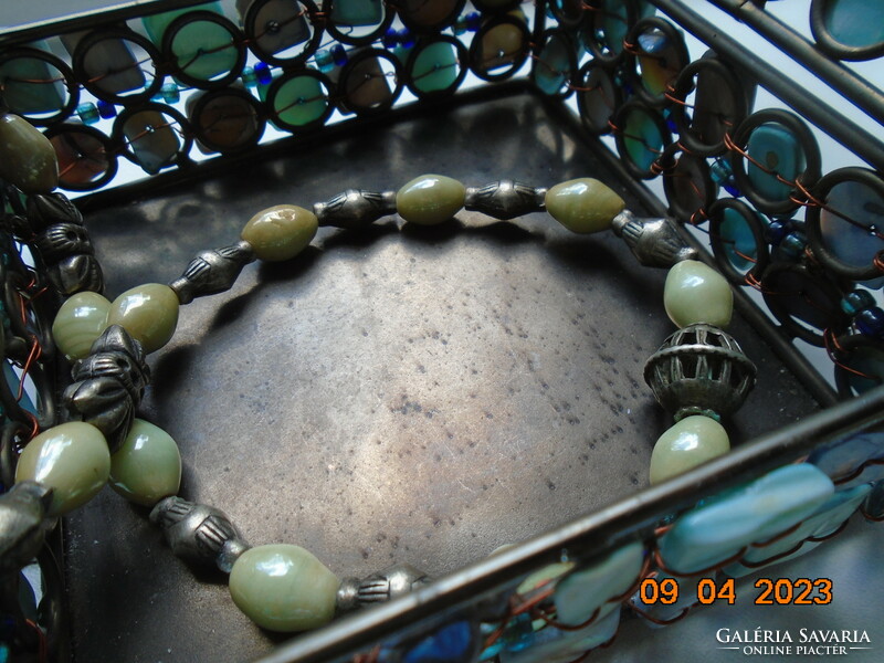 Interesting neck blue Celtic knot with gold thread cord, pale green opal glass and figurative silver beads