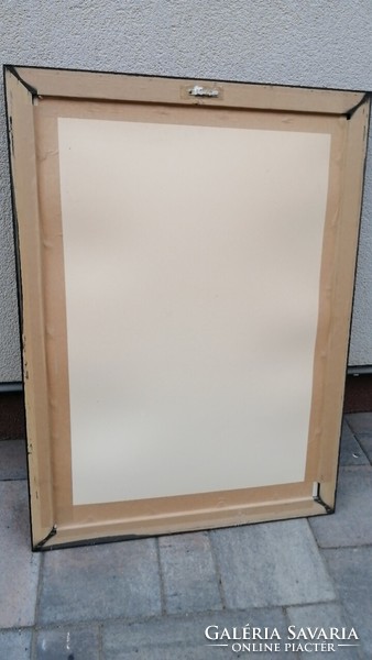 Large picture in a wooden frame