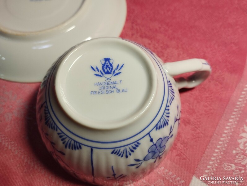 Antique porcelain coffee cup with immortelle pattern