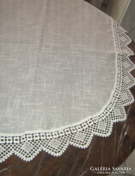 Beautiful vintage-style stained glass curtain with a special lace edge and hemmed on the right corner