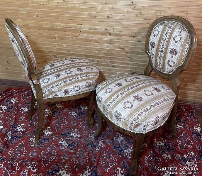 Pair of baroque lounge chairs with backrest